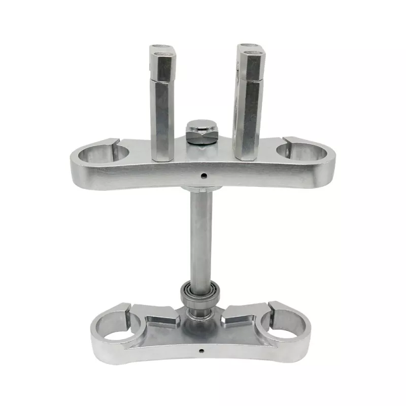 Qu'est-ce qu'une triple pince et pourquoi est-elle essentielle pour votre moto?